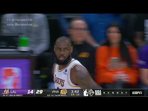 LeBron puts up a three over Ayton