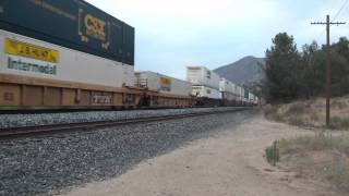 preview picture of video 'BNSF 4399 Leads a Stack Train Through Woodford HD'