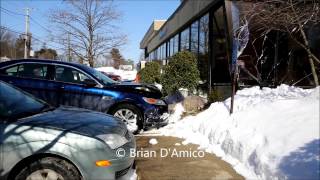 preview picture of video 'Dedham MA - Car Drives Throught Front of Bank of America, Washington Street - 2/25/15'