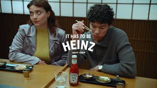 Heinz Boy eating sushi with tomato sauce