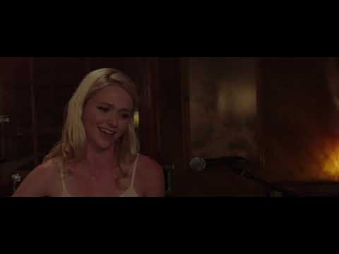 Johanna Braddy singing in Run The Tide
