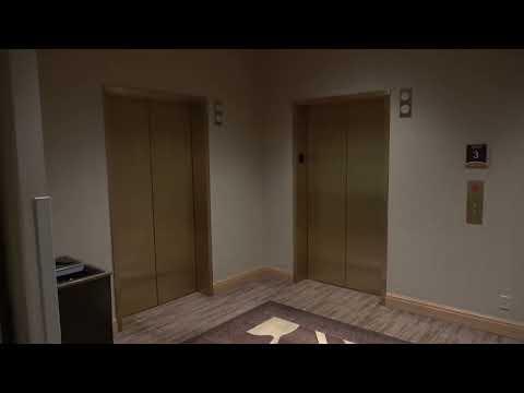 Strange Otis Elevonic 401 Traction Elevators at The Hyatt Regency Cascades Tower in Bellevue, WA