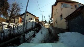 preview picture of video 'Fiat Panda 4x4 pushing up steep snowy street in Sarajevo old town'