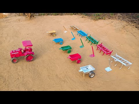 The tractor ploughed the field, leaving the tiller behind, and took the soil in a trolley#235