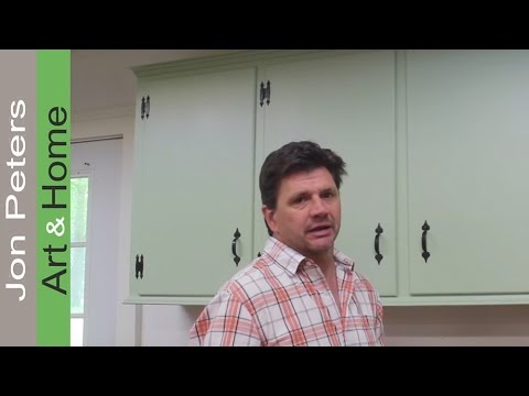 image-How can I restore the look of worn kitchen cabinets?