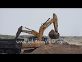 Sand Mining With Heavy Machinery At A Beach In The Bay Of Bengal