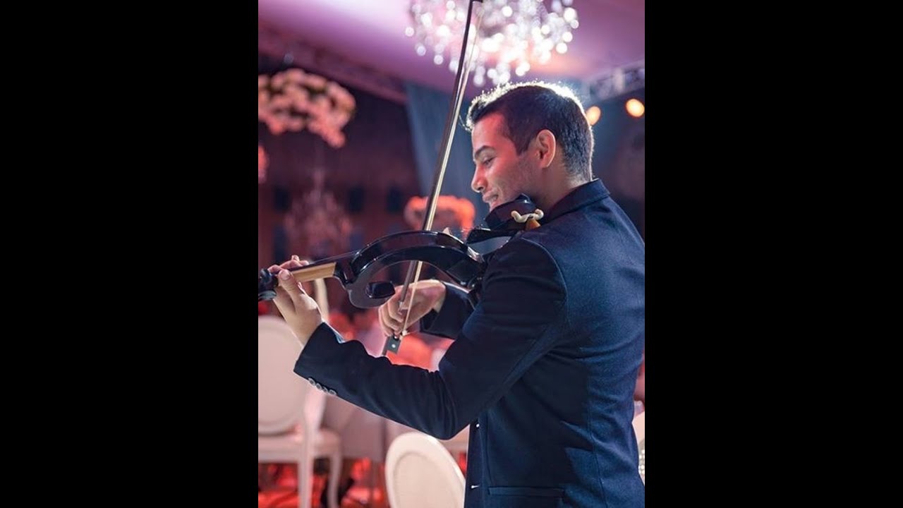 Promotional video thumbnail 2 for Dynamic and Elegant Strolling Violinist