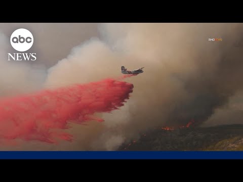 Wildfires rage in the west as smoke triggers ground stop at airport