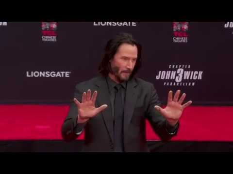 Keanu Reeves celebrates being "a part of the dream" after placing his handprints in cement outside Hollywood's famed TCL theater Tuesday. (May 15).