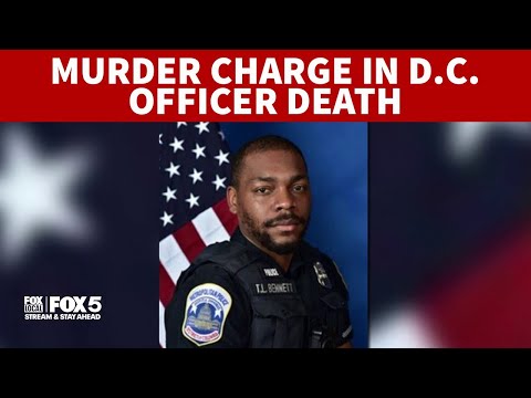 Driver charged with murder in death of DC officer
