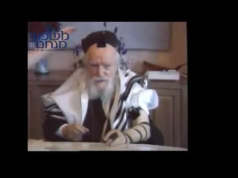 Rabbi Moshe Feinstein Putting On Tefillin