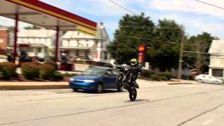 preview picture of video 'Crazy Bloak On Honda Supermoto Wheeling Past New Freedom Rutters'