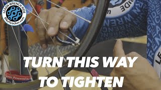 Turn the spoke wrench this direction to tighten.