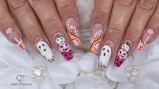 Doing my client gel rebalance with cute Halloween Nail Art. Patch work nail art with flowers 