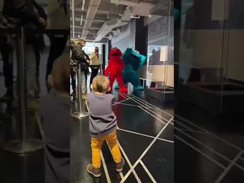 Meeting Elmo & Cookie Monster at Empire State Building lighting #sesamestreet
