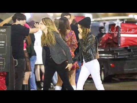 Cara Delevigne & Girlfriend Minke Hold Hands While Attending Harry Styles Concert