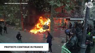 France protests turn violent in Paris with fires burning, shops looted, raw livestream footage shows