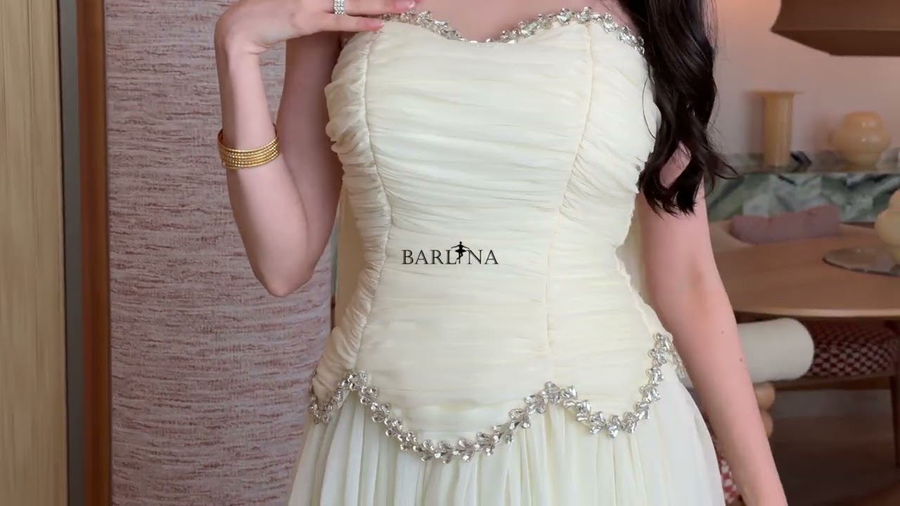 Off-white evening dress with crystal details - XXL