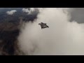 wingsuit fly between the clouds .сквозь облака 