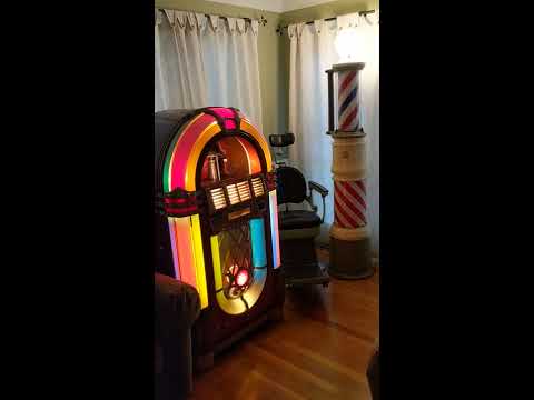 Mic's Wurlitzer 1015 Bubbler Jukebox, 1930s Paidar Barber Pole, and 1950s Ritter Dental Chair