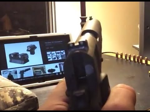 1911 trijicon night sights.