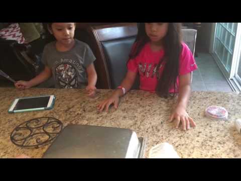Zuly and Jackie Baking a Cake