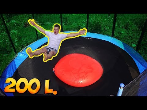 JUMPING ON A 200-LITER GIANT WATER BALLOON LAYING ON A TRAMPOLINE