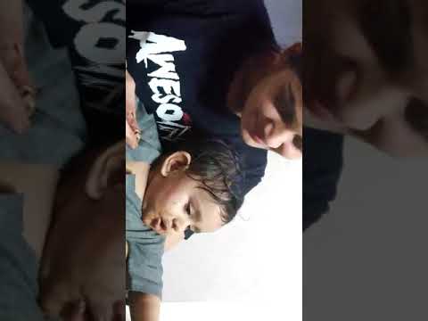 Baby Dinku playing with Chocolate...