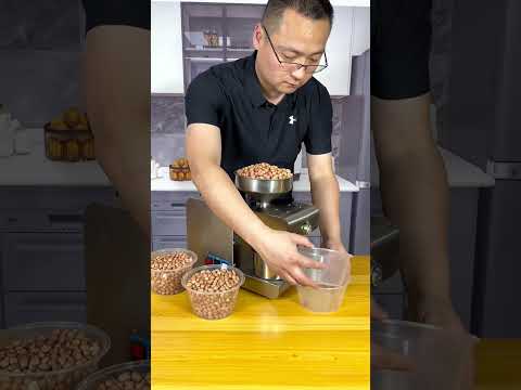 How many kilograms of peanuts can produce one kilogram of peanut oil? Household oil press #7