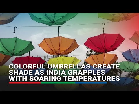 Colorful umbrellas create shade as India grapples with soaring temperatures