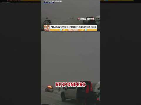 WATCH: Truck NEARLY COLLIDES with first responders during snowstorm #shorts