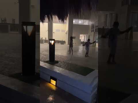 Playing in the rain in Cancun Mexico #shortsvideo #shorts #short