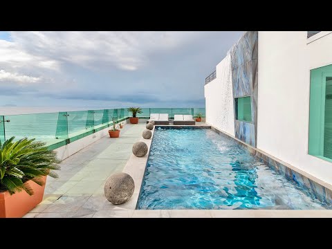 Inside a Massive $5.5 MILLION Beachfront Penthouse in Copacabana