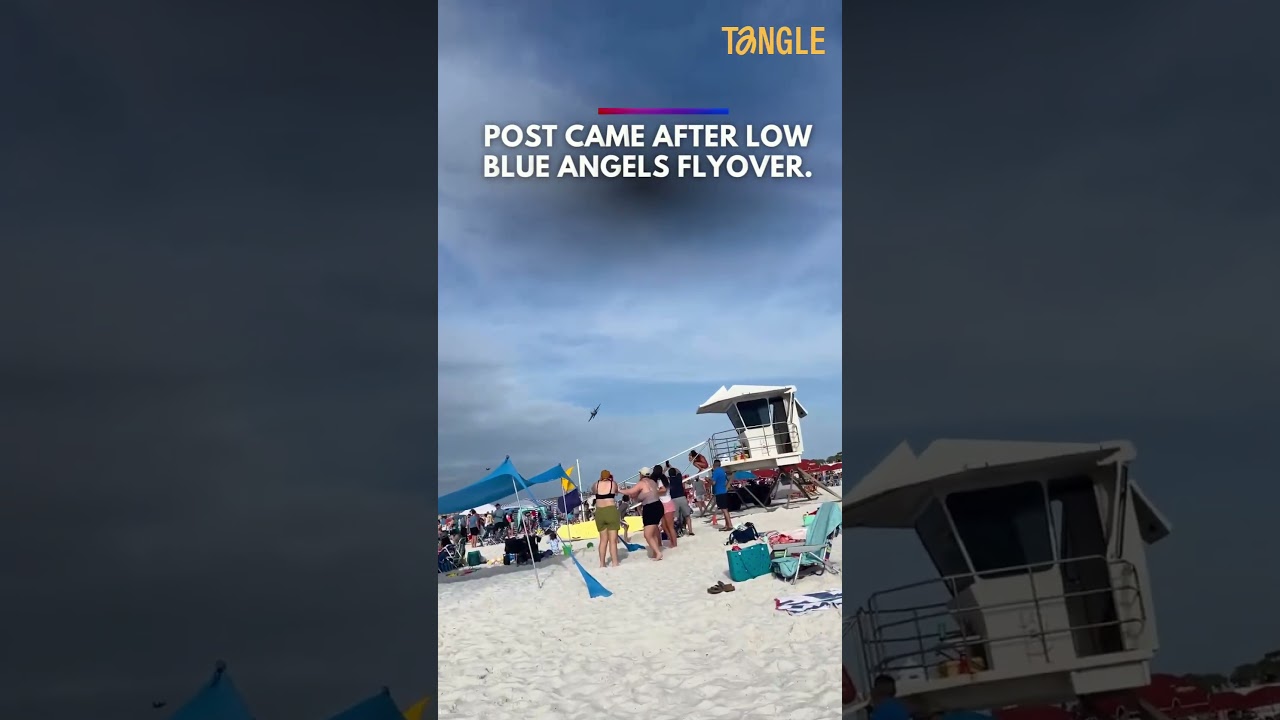 Blue Angels jet flies unusually low over Pensacola beach during air show, scatters beachgoers' chairs and umbrellas.