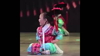 Little super cute chinese girl cries while dancing