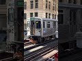 ICONIC Chicago 'L' train rattles in to Washington/Wabash in front of Trump International