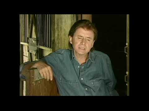 Johnny Tillotson - It Keeps Right on A Hurtin'   (Official Music Video)