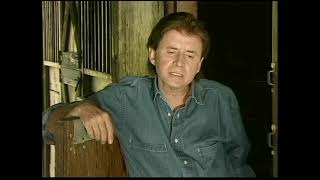 Johnny Tillotson - It Keeps Right on A Hurtin&#39;   (Official Music Video)