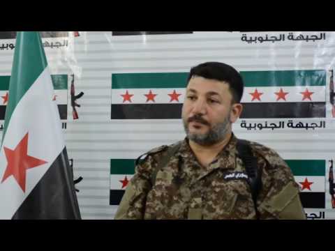 كلمة يلقيها ادهم الكراد قائد فوج الهندسة والصواريخ يتحدث عن فيها عن أسباب الحملة العسكرية على منطقة درعا البلد