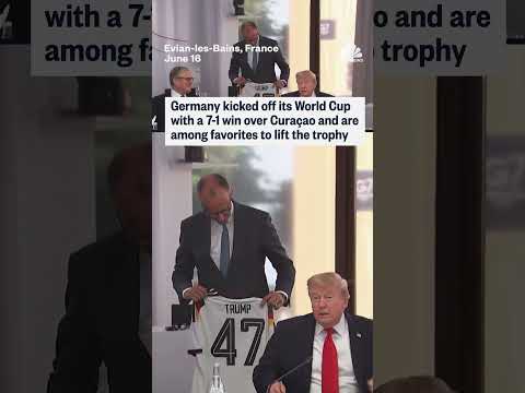 Merz gifts Trump a German national team soccer jersey