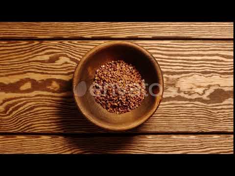 Buckwheats Fill A Wooden Dish | Stock Footage - Envato elements