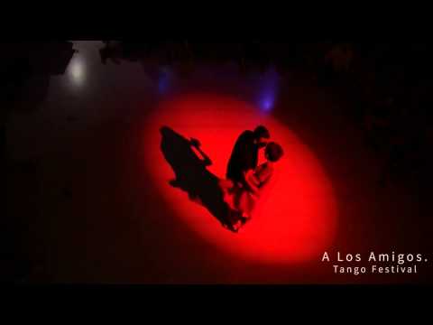  Mariano Frumboli  and  Juana Sepulveda  are  dancing  to  "  Ojos Negros  "  by  Osvaldo Pugliese  at  A los amigos tango festival  in  2015