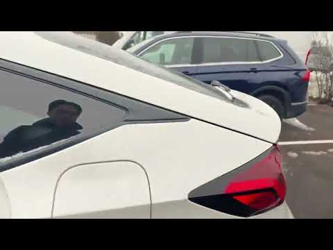 2025 Honda Civic Hatchback Sport CVT in White for sale at Finch Chrysler Dodge Jeep Ram Ltd in London, ON