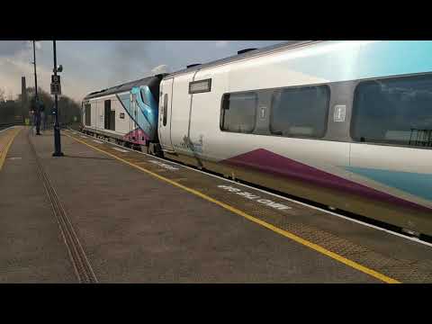 68021 departs Stalybridge on a TPE service to Liverpool Lime Street