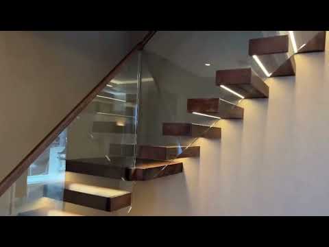 Floating Staircase Design with LED lights / CELN / USA