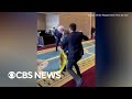 Fistfight erupts when Russian diplomat rips down Ukrainian flag at conference