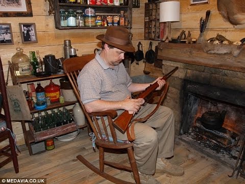 Is this the ultimate man cave? Father-of-eight converts his drab basement into authentic log cabin