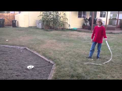 Eleven year old whip cracker putting out a candle