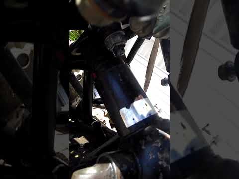 300 FourTrax Honda how two remove the lower steering bearing.