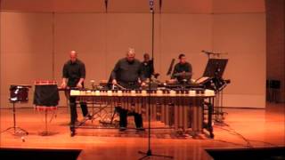 "The Dark Drum Cries.... Glory"    FOR MARIMBA SOLOIST AND PERCUSSION TRIO